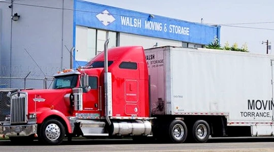 A Walsh Truck Parked in Front of Headquarters