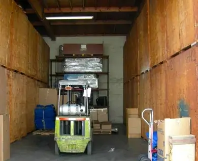 Stacking storage vaults in the warehouse