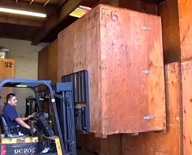 The Forklift Stacks Vaults in the Warehouse