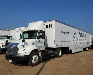 18 Wheeler Walsh trucks parked in the yard