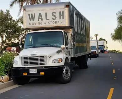 Walsh moving truck parked on the street