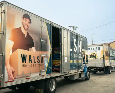 Walsh trucks loaded with moving supplies