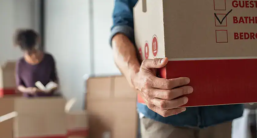 A couple prepares for a move